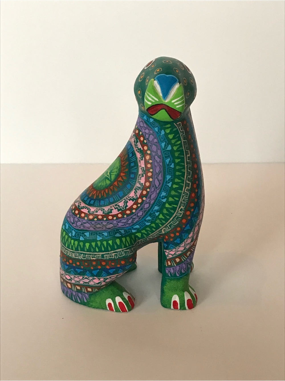 Signed Hand-Painted Teal Figurine with Colorful Accents